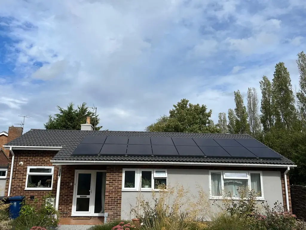 Bungalow re-roof finished with integrated solar panels by Carl Dunn Building & Roofing, Cambridge