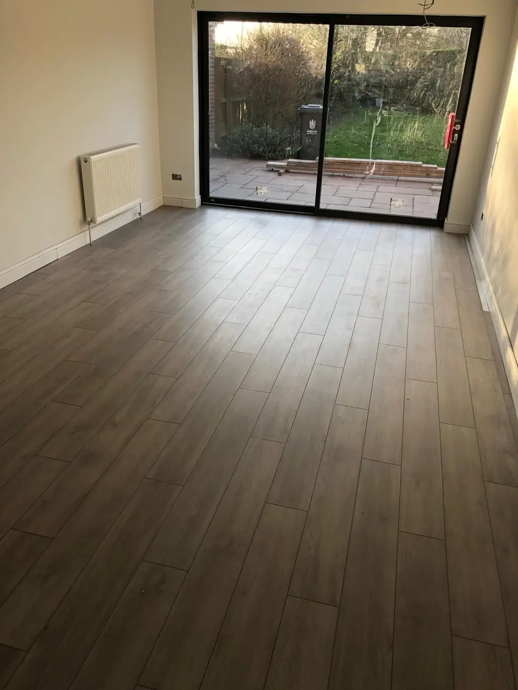 New flooring laid in a finished extension by Carl Dunn Building & Roofing, Cambridge