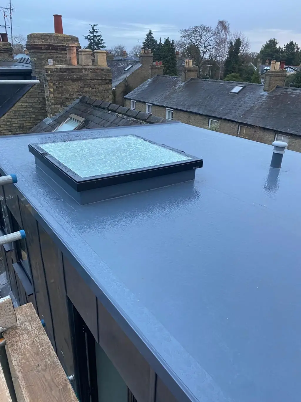 Flat rooflight on a grey flat roof by Carl Dunn Building & Roofing, Cambridge