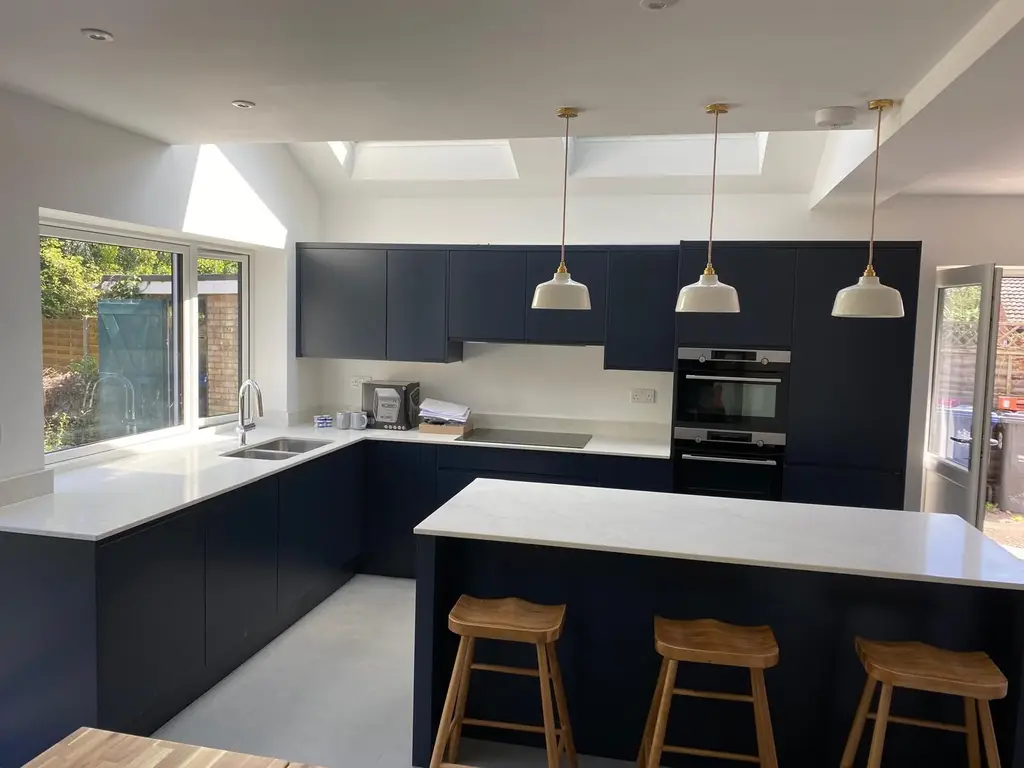 Kitchen extension with roof lights and island by Carl Dunn Building & Roofing, Cambridge