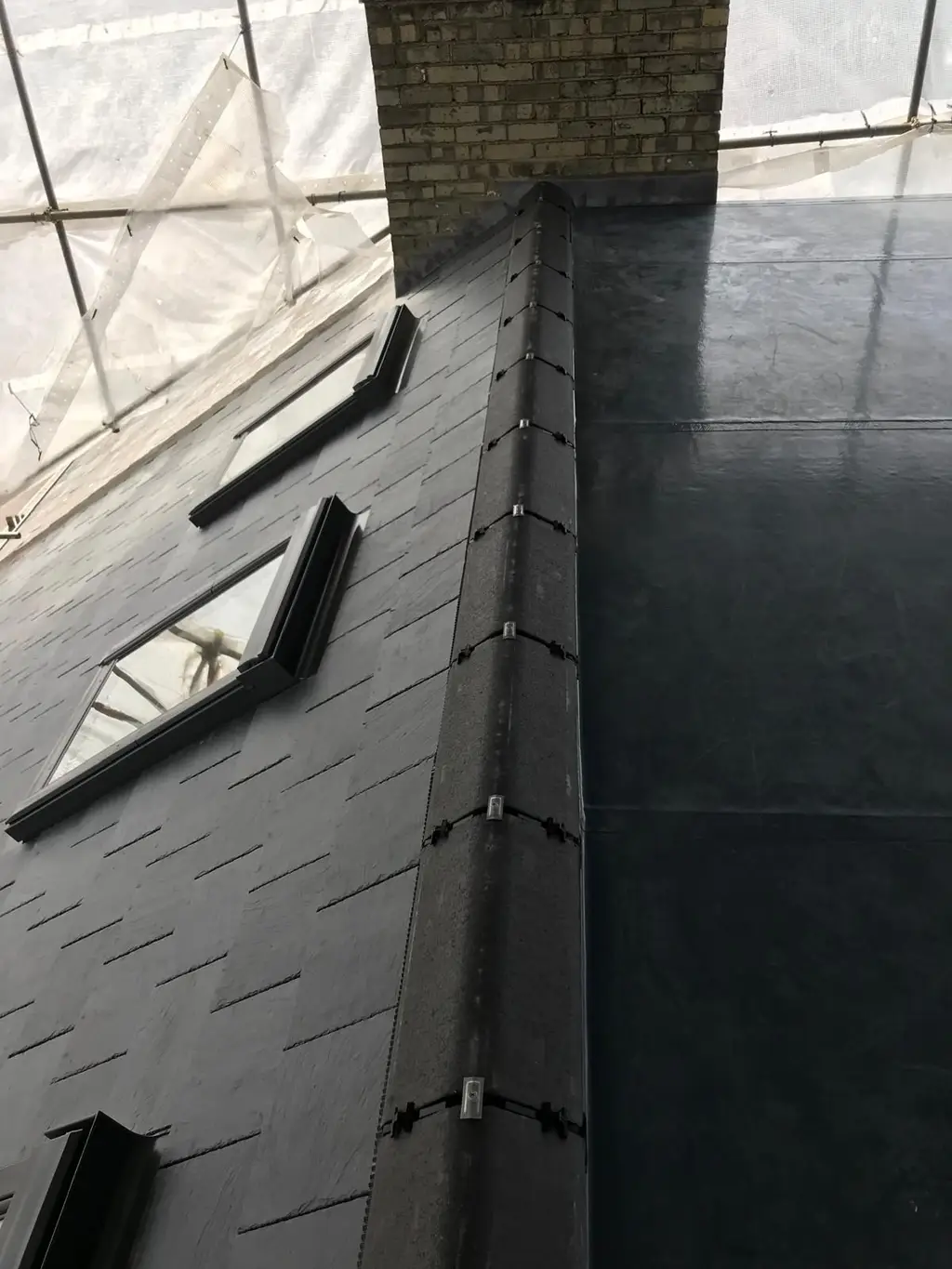 Close up of roof windows in a slate roof by Carl Dunn Building & Roofing, Cambridge