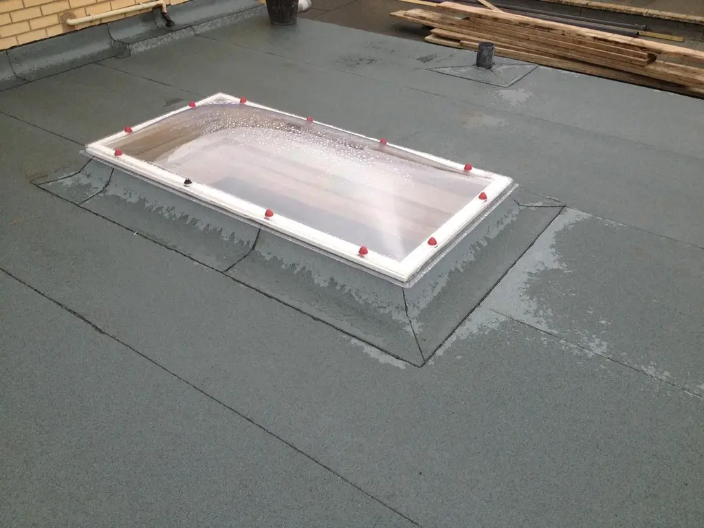Flat roof with a new rooflight upstand ready for glazing by Carl Dunn Building & Roofing, Cambridge