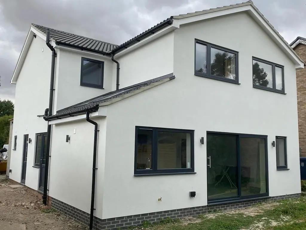 Rendered side and rear extension by Carl Dunn Building & Roofing, Cambridge