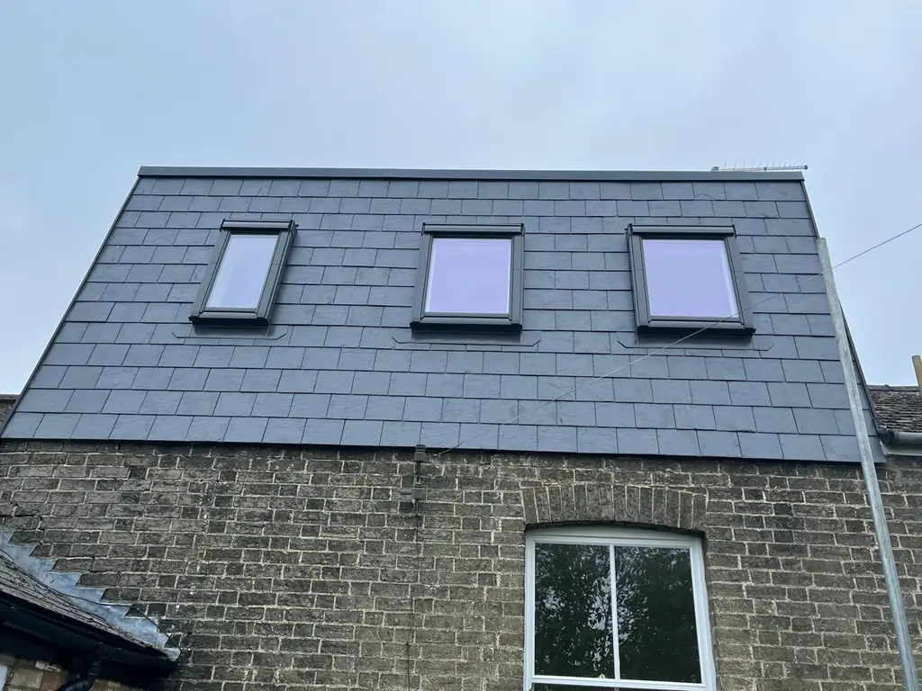 Slate roof with three new roof windows over a loft conversion by Carl Dunn Building & Roofing, Cambridge