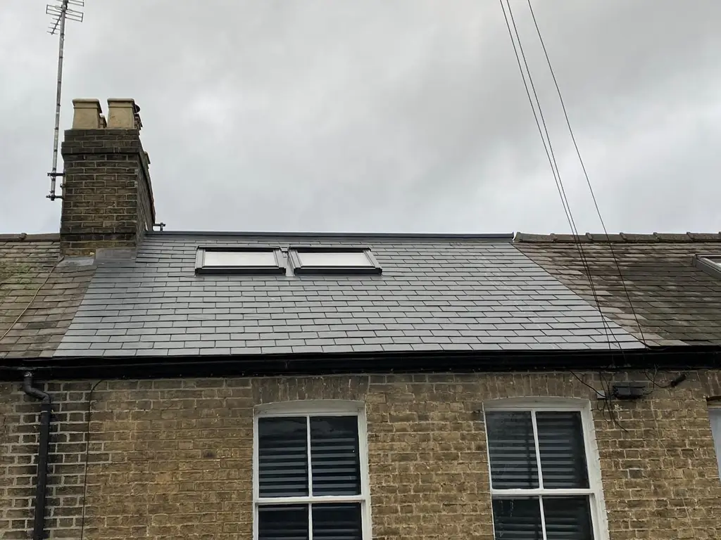 Terraced house roof with new roof windows by Carl Dunn Building & Roofing, Cambridge