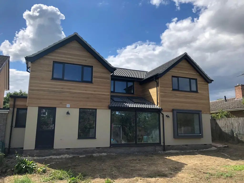 Two storey extension with timber cladding by Carl Dunn Building & Roofing, Cambridge
