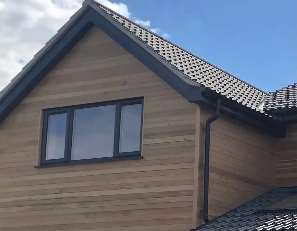 Timber clad gable end by Carl Dunn Building & Roofing, Cambridge