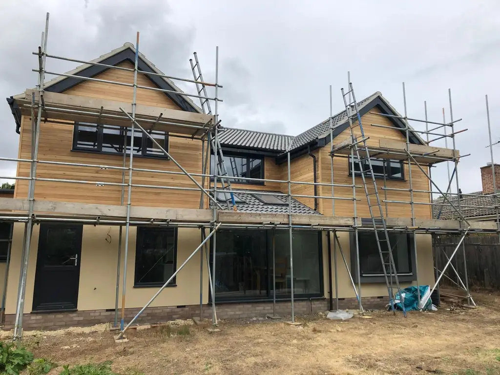 Two storey extension under construction with scaffolding by Carl Dunn Building & Roofing, Cambridge