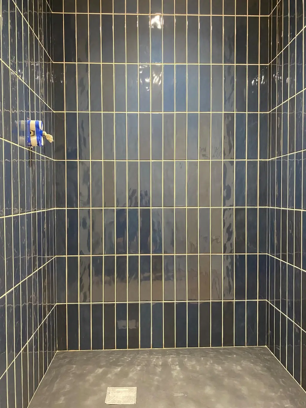Vertical tiled shower wall by Carl Dunn Building & Roofing, Cambridge